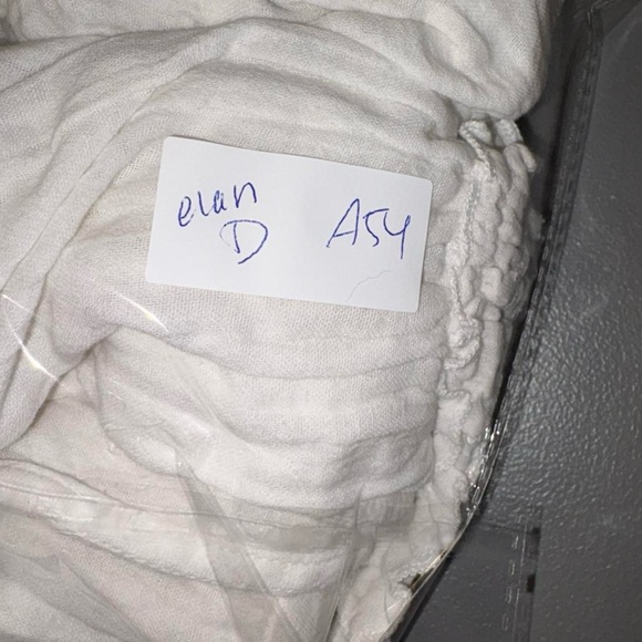 Chic White Sleeveless Midi Dress - Picture 10 of 10